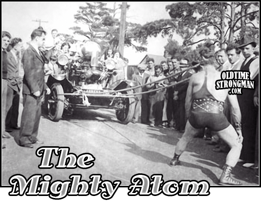the_mighty_atom_pulls_firetruck_with_hair