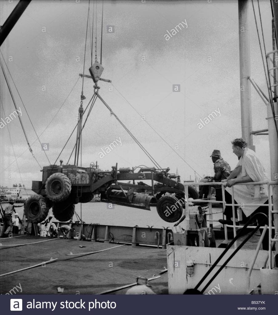 This image has an empty alt attribute; its file name is east-african-groundnuts-scheme-loading-caterpillar-tractors-and-road-b537yk.jpg